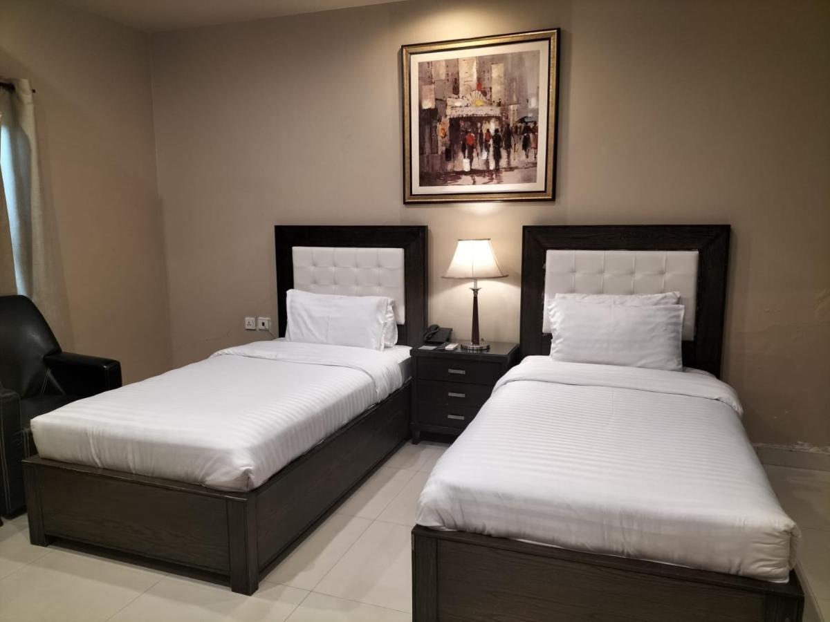 Grand Regent Hotel And Suites Faisalabad Extérieur photo